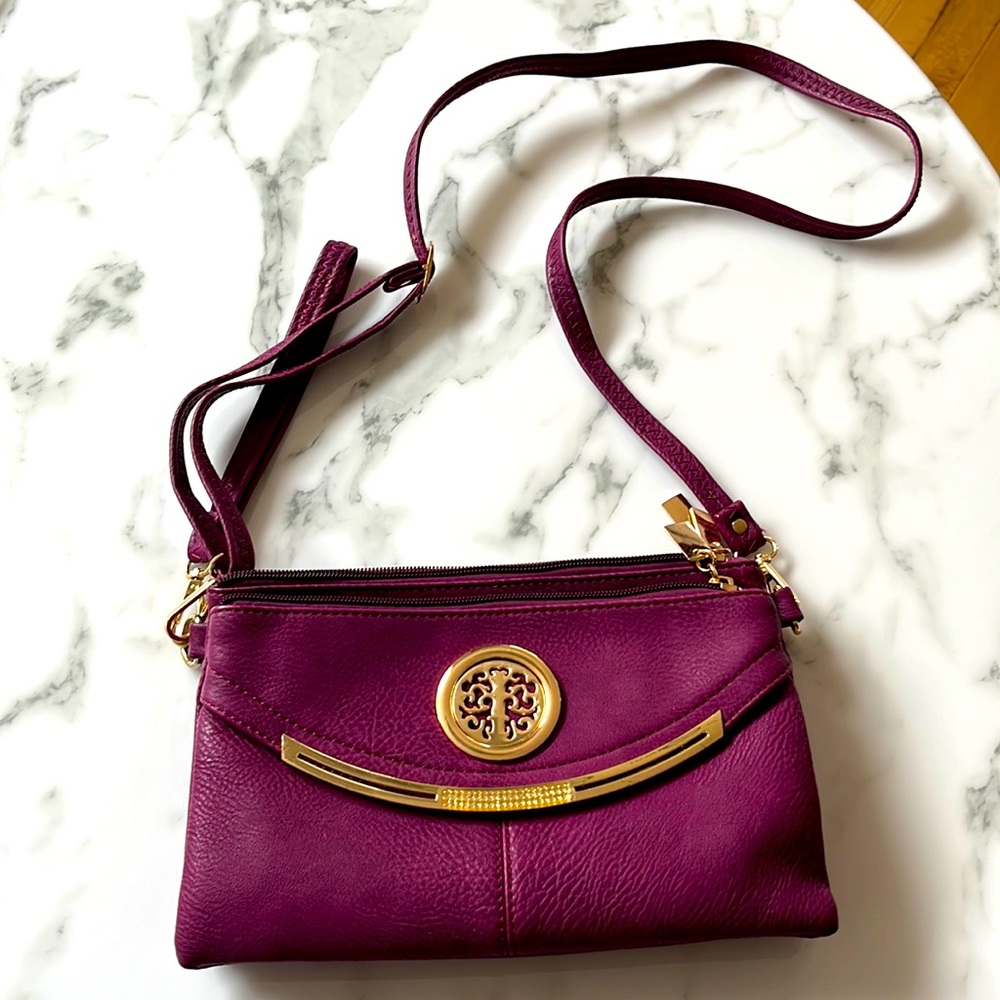 A beautiful purple ladies bag that I never used, it was a gift!